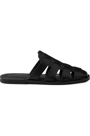 Prada Mules estilo pescador de cuero
