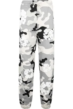 DENIM TEARS Pantalones con motivo militar