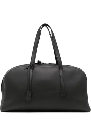 The Row Bolso weekend Gio Duffle de cuero texturizado