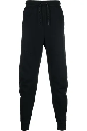 Nike Pantalones de chándal con logo Swoosh