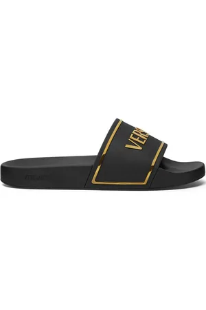 VERSACE Sandalias con logo estampado