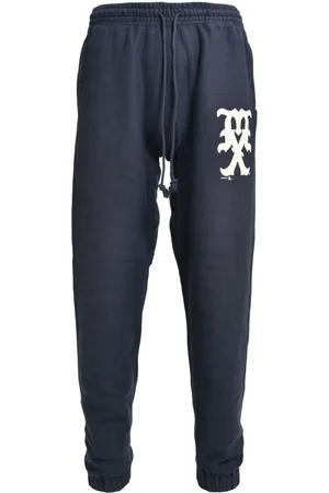SAINT MXXXXXX Pantalones de chándal estampados