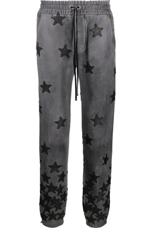AMIRI Pantalones de chándal con motivo de estrellas