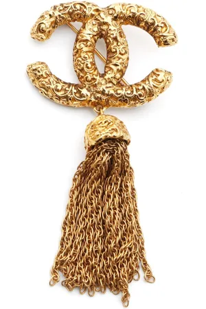 CHANEL Broche con logo CC 1993