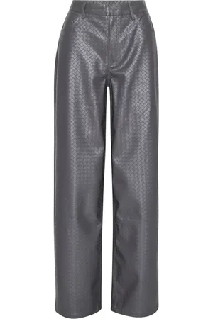 ROTATE Pantalones trenzados