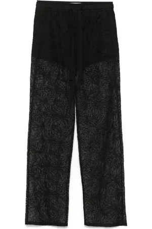 GENNY Pantalones con bordado floral