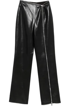Nanushka Pantalones con detalle de cremalleras
