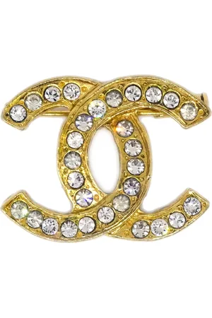 CHANEL Broche con logo CC en strass 1990-2000
