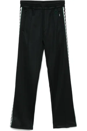 Drôle de Monsieur Pantalones de chándal con rayas laterales