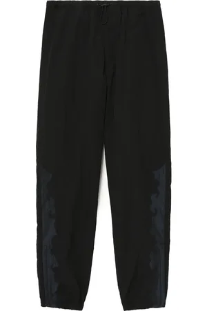 TOGA PULLA Pantalones ajustados