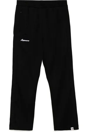 A Bathing Ape Pantalones de chándal con logo Moonface