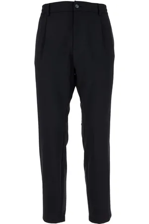 CRUNA Pantalones plisados