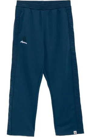 A Bathing Ape Pantalones de chándal con logo Moonface