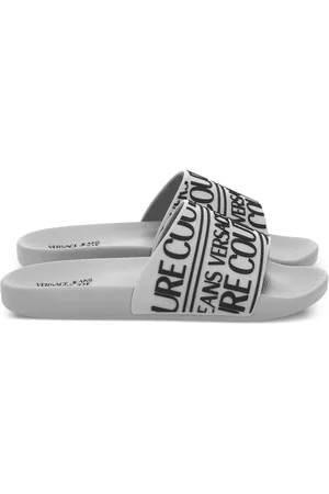 VERSACE Sandalias con logo de goma