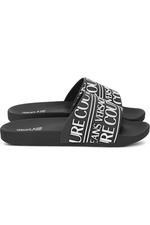 VERSACE Sandalias con logo de goma