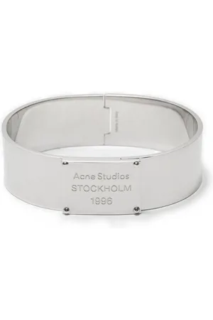 Acne Studios Pulsera con logo grabado