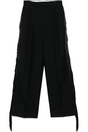 Carven Pantalones con flecos
