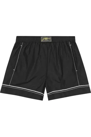Ganni Bermudas con parche del logo