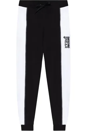 Moschino Pantalones holgados a rayas laterales