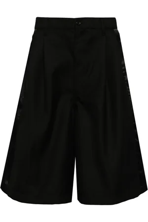 Comme des Garçons Bermudas con pinzas