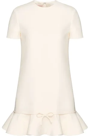 VALENTINO GARAVANI Vestido con peplum y lazo