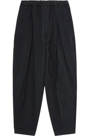 Comme des Garçons Pantalones fluidos con pinzas