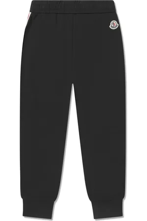 Moncler Pantalones de chándal con rayas laterales
