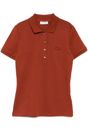 Lacoste Polo con parche del logo