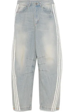 adidas Vaqueros con tres rayas