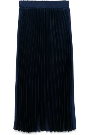 Kaos Falda midi plisada