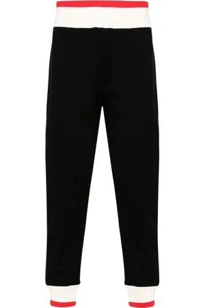 Alexander McQueen Pantalones de chándal con logo estampado