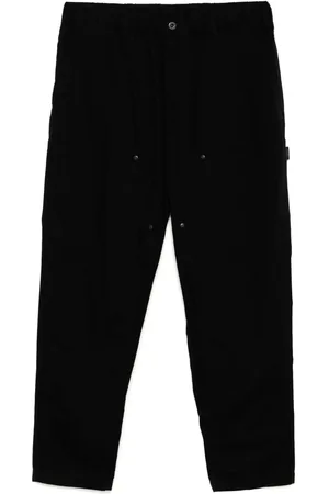 YOHJI YAMAMOTO Pantalones ajustados a paneles