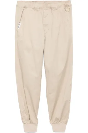 A Bathing Ape Pantalones ajustados con parche del logo