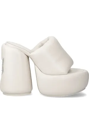 Naked Wolfe Zuecos slip-on con plataforma