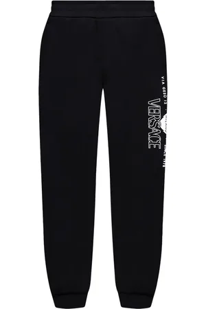 VERSACE Leggins con logo estampado