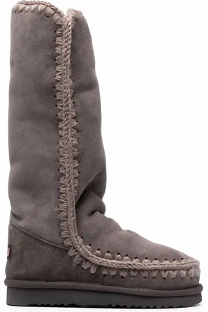 Mou Botas con parche del logo