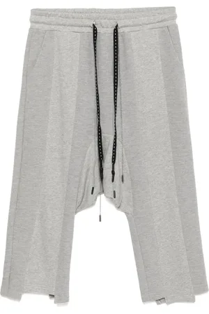 MOSTLY HEARD RARELY SEEN Pantalones de tiro caído a paneles