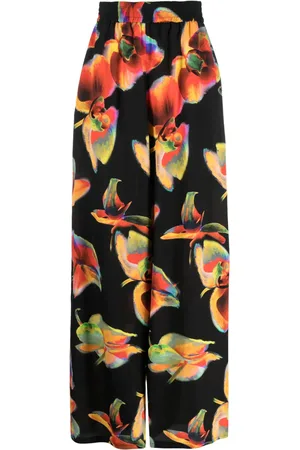 Alexander McQueen Pantalones anchos con motivo Solarised Orchid