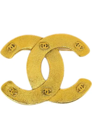 CHANEL Broche con logo CC 1990-2000