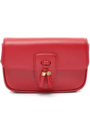 Céline Riñonera con detalle de borlas 2010
