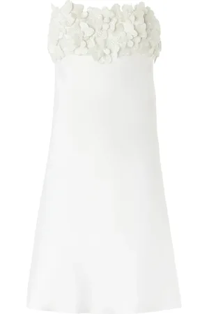 GENNY Vestido corto con apliques florales