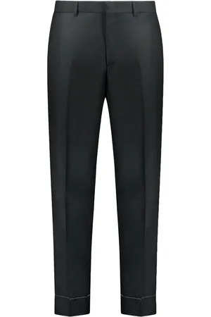 BRIONI Pantalones de vestir de lana