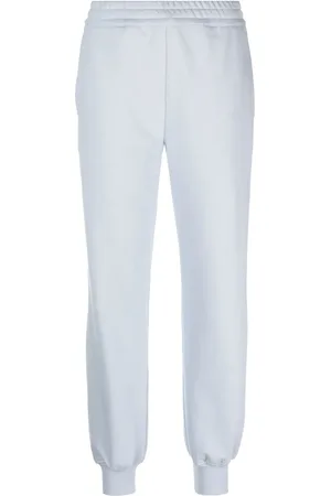 Alexander McQueen Pantalones de chándal con logo estampado