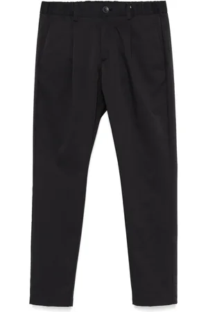HERNO Pantalones ajustados con placa del logo