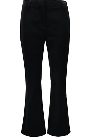 CÉDRIC CHARLIER Pantalones con bolsillos