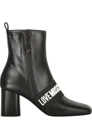 Moschino Botas con logo de letras y tacón de 70 mm
