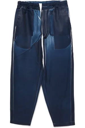 Comme des Garçons Pantalones con estampado vaquero