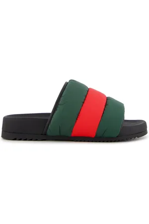 Gucci Sandalias acolchadas con tribanda Web