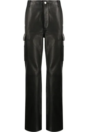 AMIRI Pantalones con placa del logo y acabado cepillado