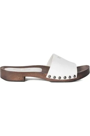 Miu Miu Zuecos de charol